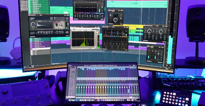 A large screen showing effects and EQ plugins